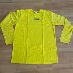 Adagacai Dress Your Passion Long Sleeve Graphic Yellow T Shirt Unisex Sz L NWOT